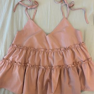 pink ruffled tank top